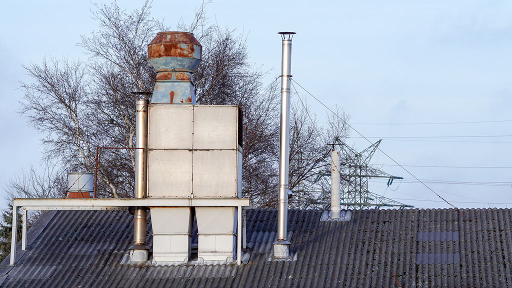 Installation d'un caisson VMC double flux dans des combles aménagés